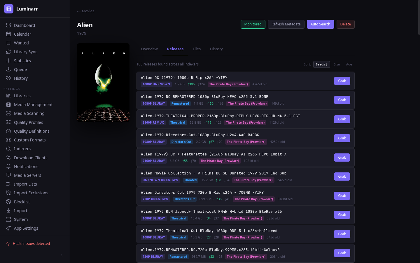 Manual release search for Alien showing releases with quality badges, edition tags, and grab buttons